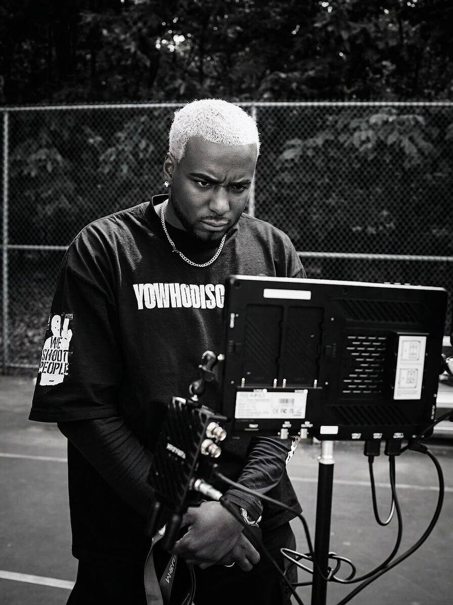 Ishell Vaughan, award-winning cinematographer, behind a professional cinema camera